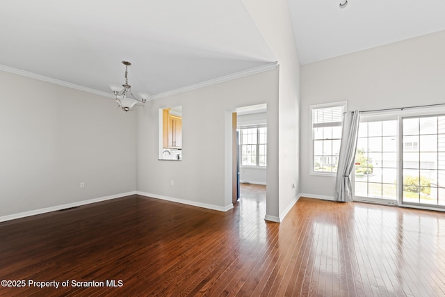2103 Robinson Close, Moosic, PA 18507 - spare room with a chandelier, ornamental molding, and wood-type flooring