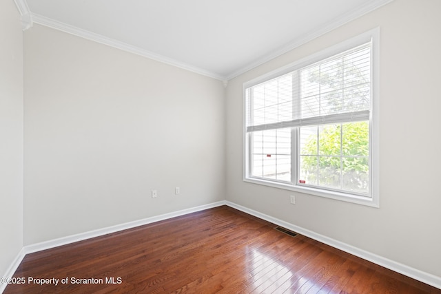 2103 Robinson Close, Moosic, PA 18507 - spare room featuring dark wood-type flooring and crown molding