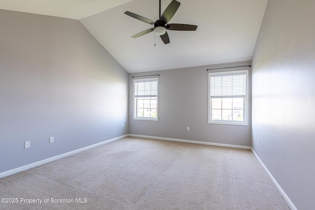 2103 Robinson Close, Moosic, PA 18507 - unfurnished room with vaulted ceiling, a ceiling fan, and light colored carpet