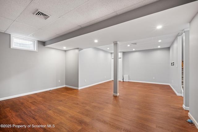 2103 Robinson Close, Moosic, PA 18507 - below grade area featuring wood finished floors, a drop ceiling, and recessed lighting