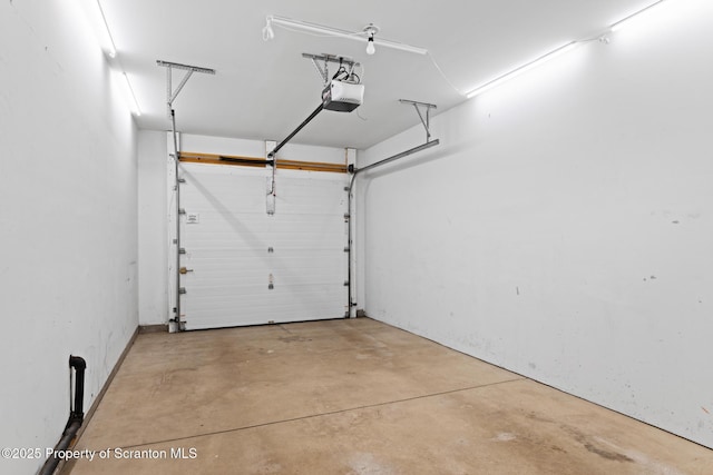 2103 Robinson Close, Moosic, PA 18507 - garage featuring a garage door opener