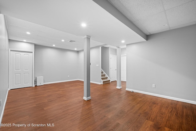 2103 Robinson Close, Moosic, PA 18507 - finished below grade area featuring stairway, recessed lighting, wood finished floors, and a paneled ceiling