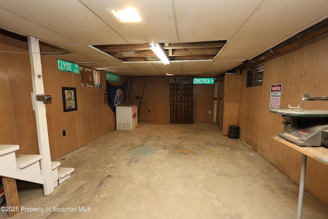 finished basement with wooden walls