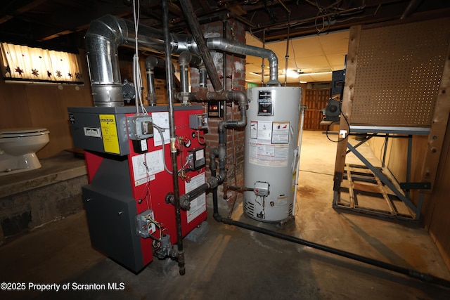 utilities featuring gas water heater and a heating unit