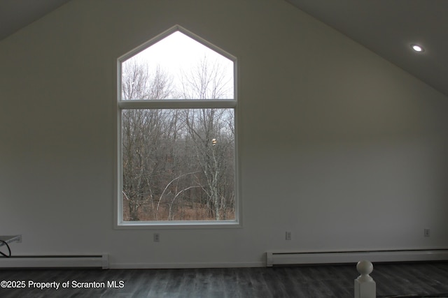 interior space with wood finished floors, a baseboard radiator, lofted ceiling, recessed lighting, and a baseboard heating unit