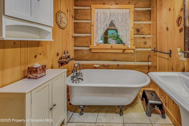 5 Capricorn Cir, Lake Ariel, PA 18436 - full bath with a freestanding bath, wood walls, and tile patterned floors