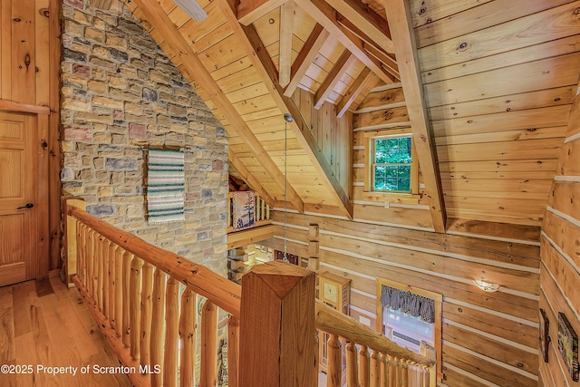 5 Capricorn Cir, Lake Ariel, PA 18436 - hall with wood ceiling, an upstairs landing, wood finished floors, and wood walls