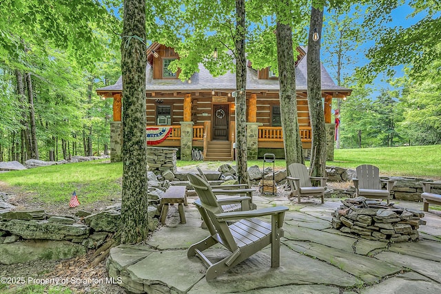 5 Capricorn Cir, Lake Ariel, PA 18436 - view of patio featuring a fire pit