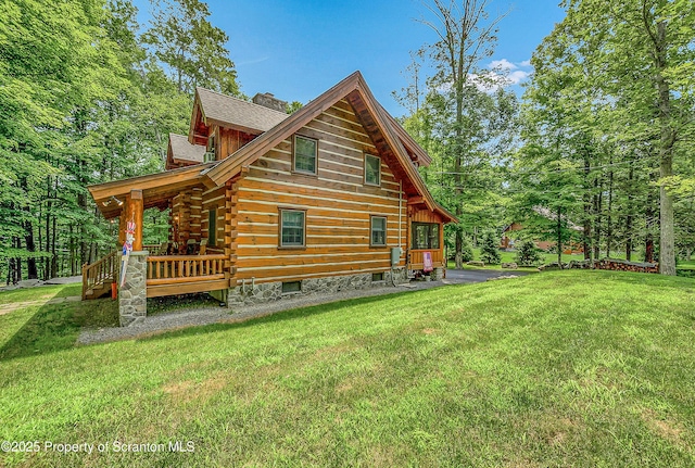5 Capricorn Cir, Lake Ariel, PA 18436 - back of property with a yard, a chimney, and log exterior