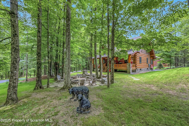 5 Capricorn Cir, Lake Ariel, PA 18436 - view of grassy yard with a wooden deck