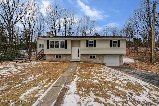 raised ranch with a garage