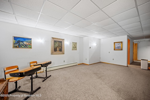 32 Christy Ln, Scott Twp, PA 18447 - living area with baseboard heating, a paneled ceiling, and carpet floors