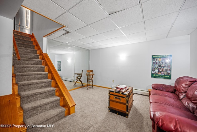 32 Christy Ln, Scott Twp, PA 18447 - living room with a drop ceiling, carpet flooring, stairs, and a baseboard heating unit