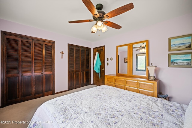 32 Christy Ln, Scott Twp, PA 18447 - carpeted bedroom featuring two closets and a ceiling fan