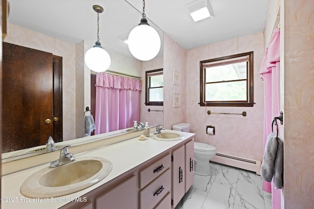 32 Christy Ln, Scott Twp, PA 18447 - full bath featuring baseboard heating, double vanity, marble look tile flooring, and a shower with shower curtain