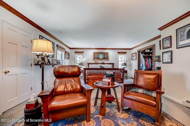 sitting room featuring crown molding, plenty of natural light, and carpet floors