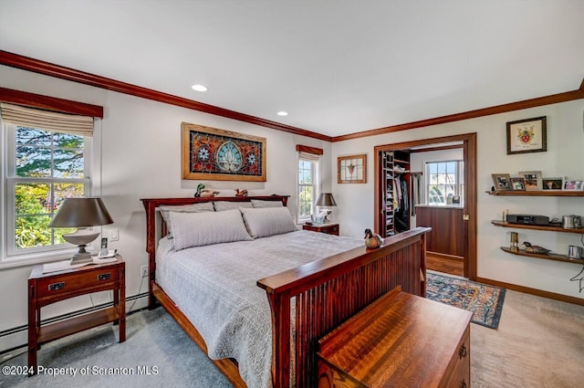 bedroom featuring carpet, a baseboard radiator, multiple windows, and crown molding