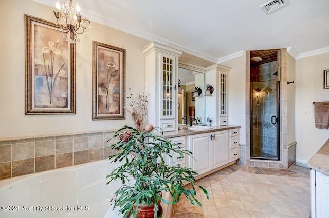 bathroom with separate shower and tub, vanity, and ornamental molding