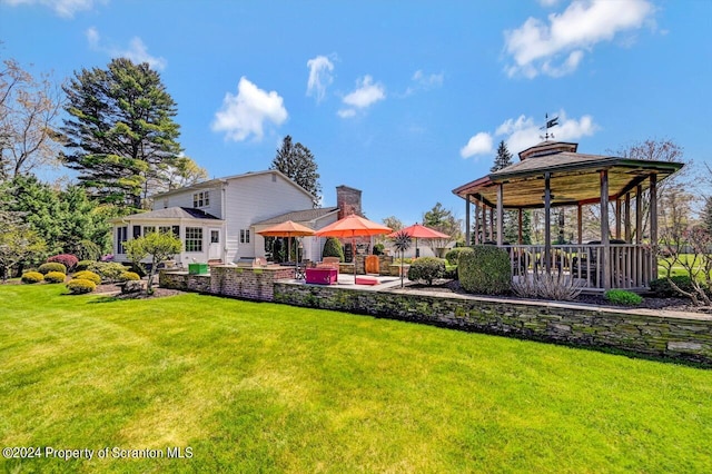 view of yard with a gazebo and a patio area