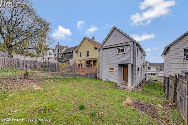 rear view of property with a residential view and entry steps