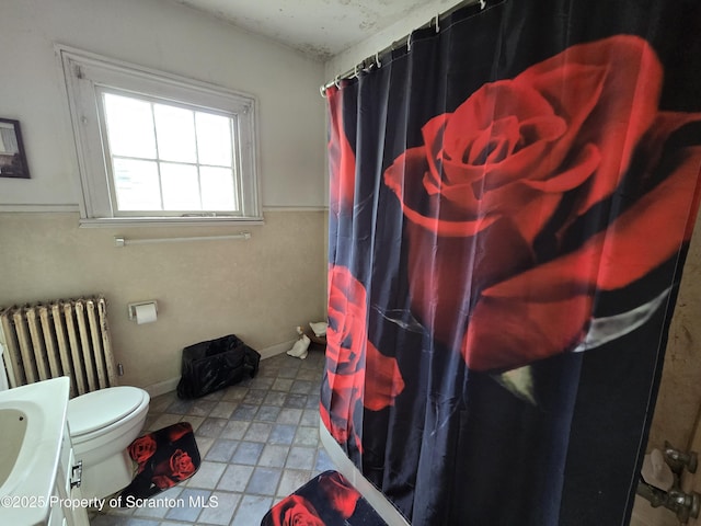 4 Little Ireland Rd, Starrucca, PA 18462 - full bathroom featuring radiator, toilet, curtained shower, and vanity