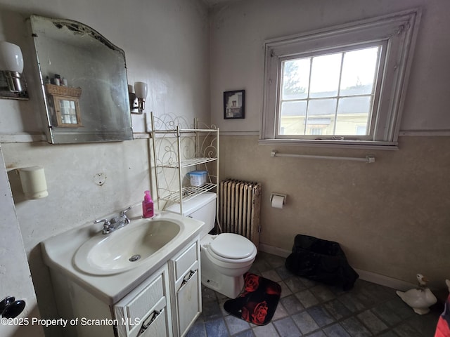 4 Little Ireland Rd, Starrucca, PA 18462 - bathroom with radiator, toilet, and vanity