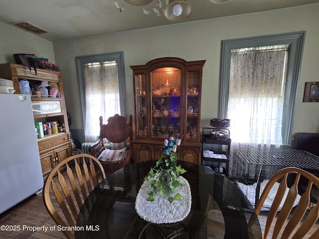 4 Little Ireland Rd, Starrucca, PA 18462 - dining space featuring plenty of natural light and dark wood finished floors
