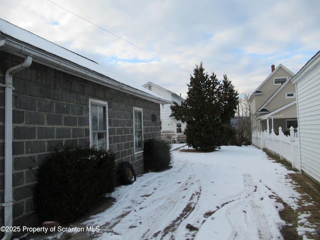 view of yard covered in snow