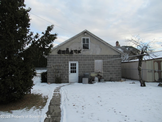 view of snow covered property