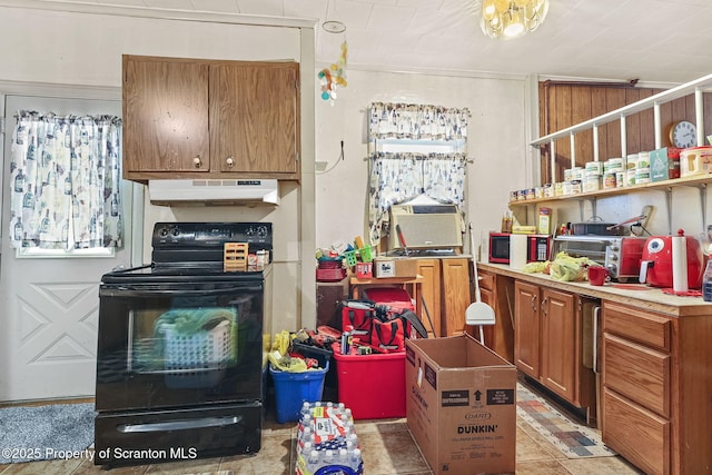 215 St Fr Cabrini Ave Unit Fr, Cabrini, Scranton, PA 18504 - kitchen featuring under cabinet range hood, black electric range oven, cooling unit, brown cabinets, and light countertops