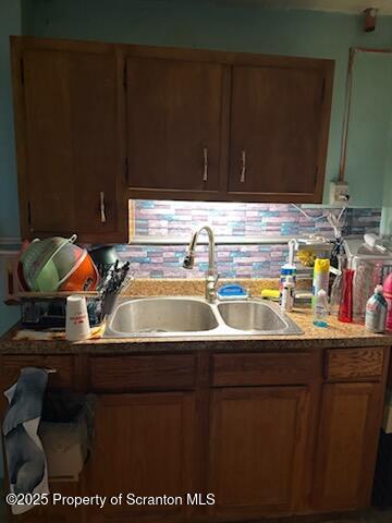 215 St Fr Cabrini Ave Unit Fr, Cabrini, Scranton, PA 18504 - kitchen featuring light countertops and decorative backsplash