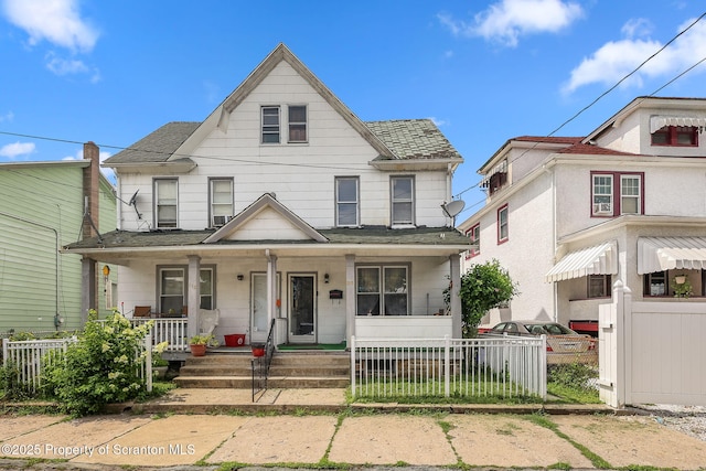 215 St Fr Cabrini Ave Unit Fr, Cabrini, Scranton, PA 18504 - view of front of home with covered porch, a fenced front yard, and a shingled roof