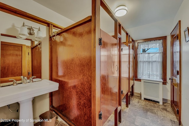 bathroom with radiator heating unit