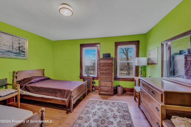 bedroom featuring light wood-type flooring