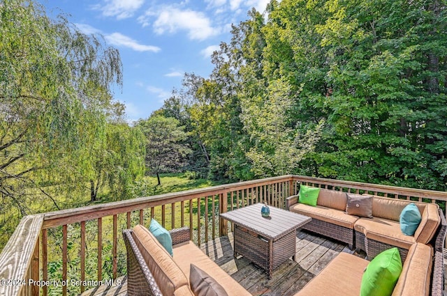 deck featuring an outdoor living space