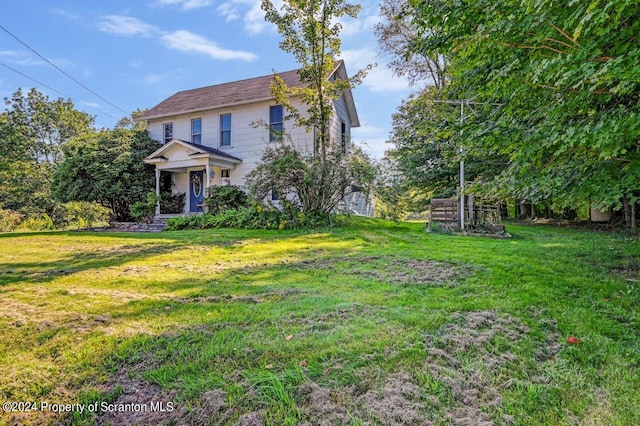 view of front of house with a front lawn