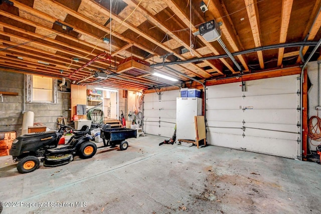 garage featuring a garage door opener