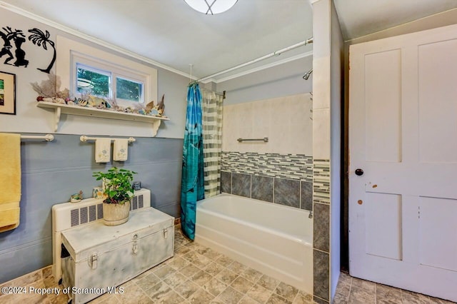 bathroom featuring shower / bathtub combination with curtain and ornamental molding