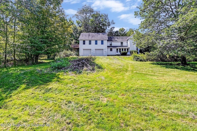 view of yard with a garage