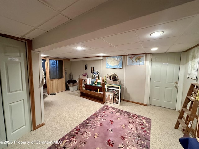 interior space featuring a paneled ceiling