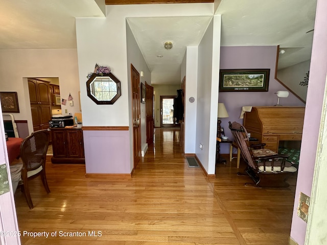 hall featuring light hardwood / wood-style flooring