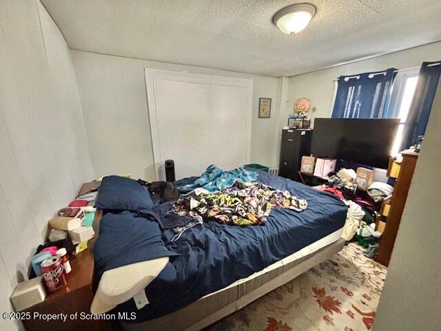 bedroom with a textured ceiling