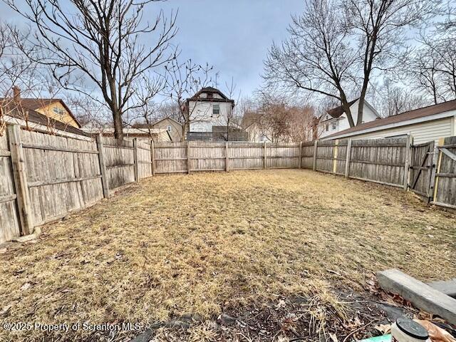 view of yard featuring a fenced backyard