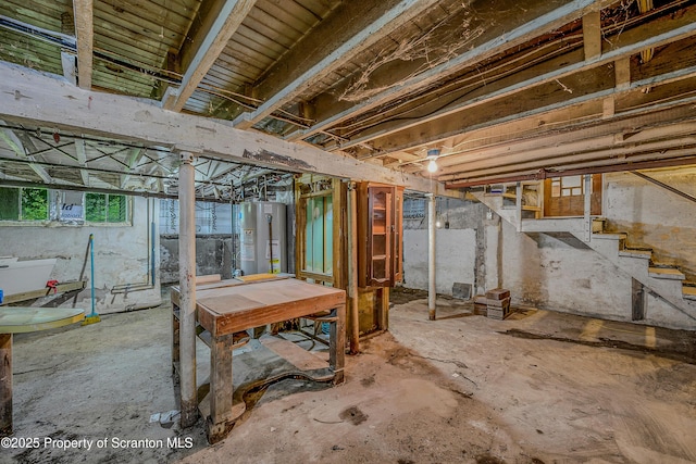 837 Old State Rd, Waverly Twp, PA 18411 - basement featuring water heater and stairway