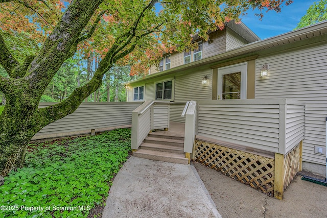 837 Old State Rd, Waverly Twp, PA 18411 - view of exterior entry featuring a deck