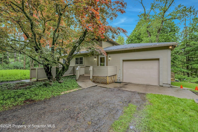 837 Old State Rd, Waverly Twp, PA 18411 - obstructed view of property with driveway and a garage