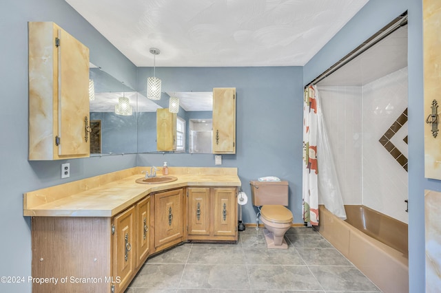 full bathroom with tile patterned flooring, shower / tub combo, vanity, and toilet