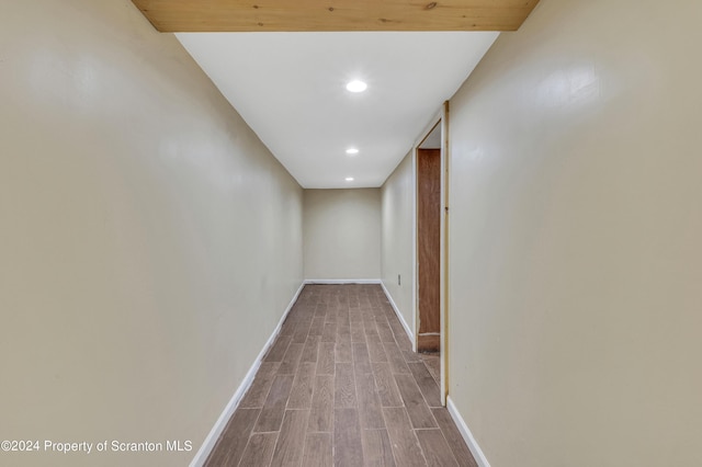 corridor featuring hardwood / wood-style flooring