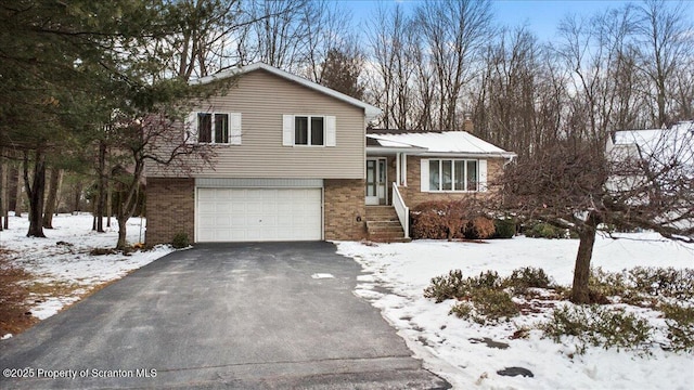 tri-level home featuring a garage