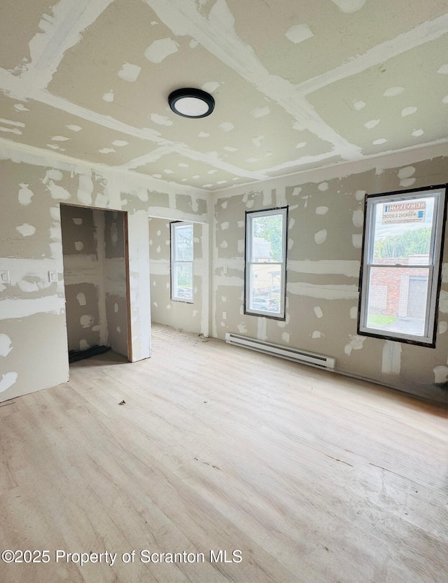 1537 Gardner Ave, Scranton, PA 18509 - unfurnished room featuring a baseboard radiator and wood finished floors